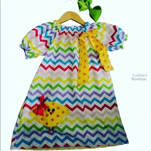 Chevron Easter dress, green hair bow included. Could possibly fit 4t.